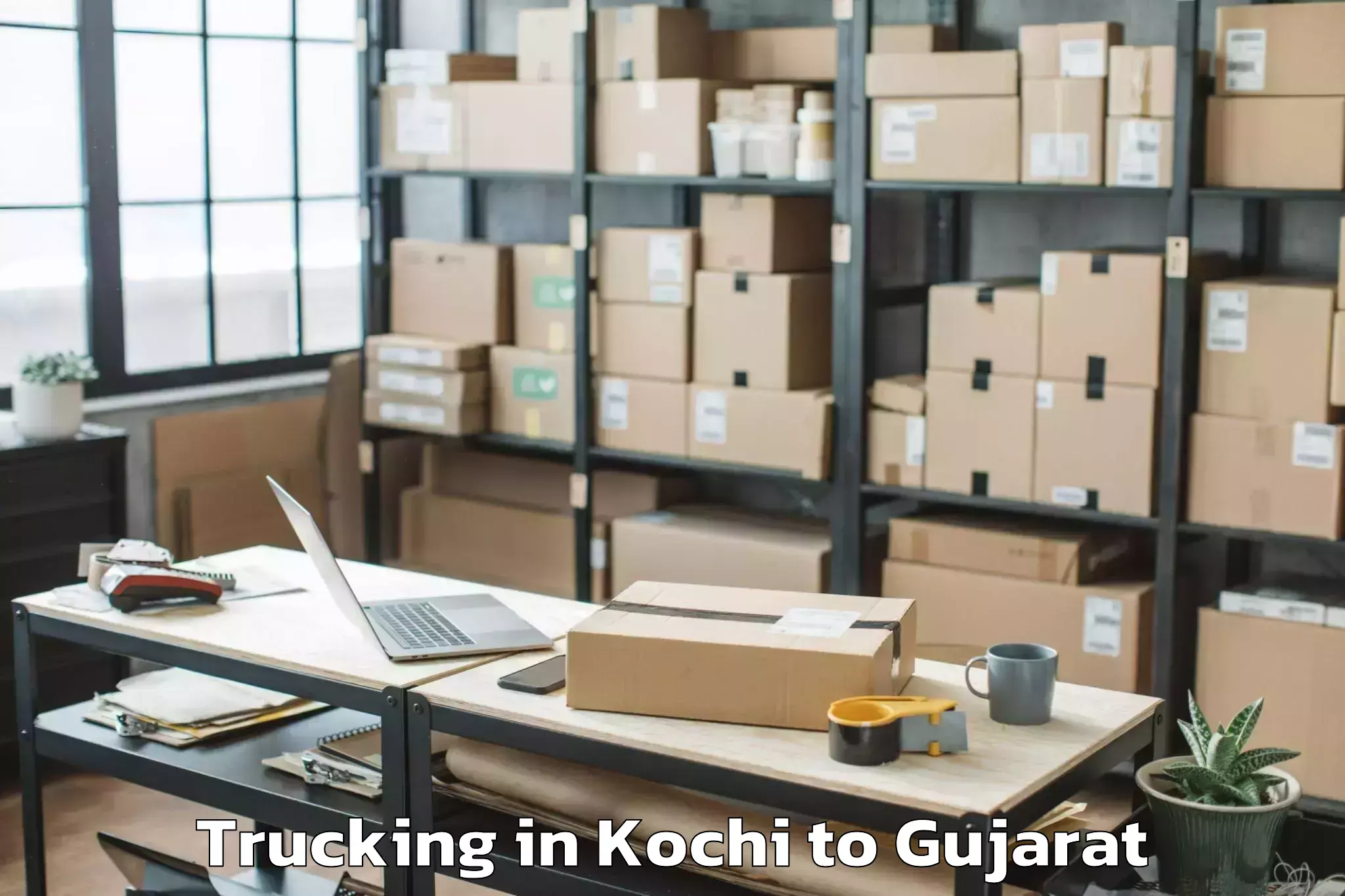 Expert Kochi to Kamrej Trucking